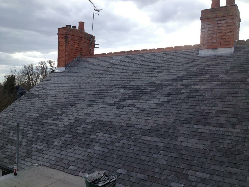 Completed roofing work photographed from the scaffold platform