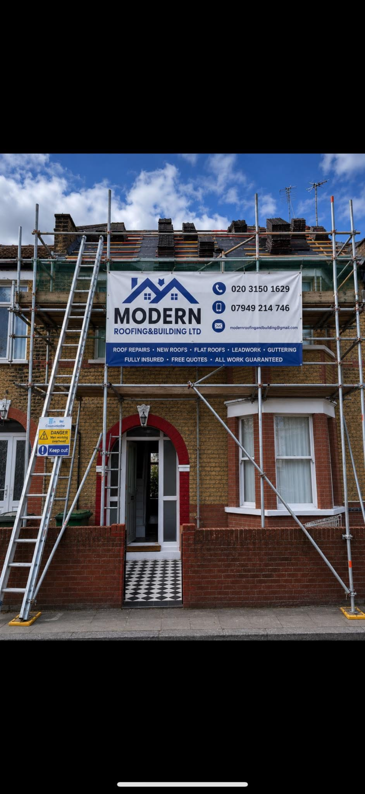 House roof mid-project with membrane and battens exposed on one slope