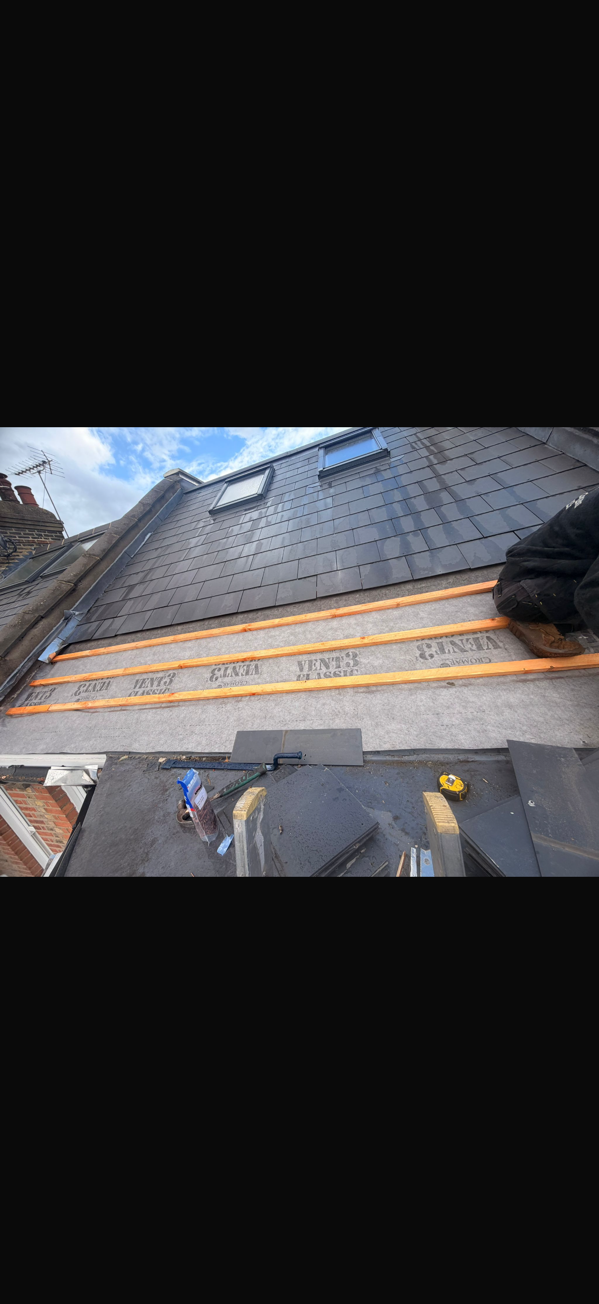 Roof timbers and rafters exposed during a strip and re-roof