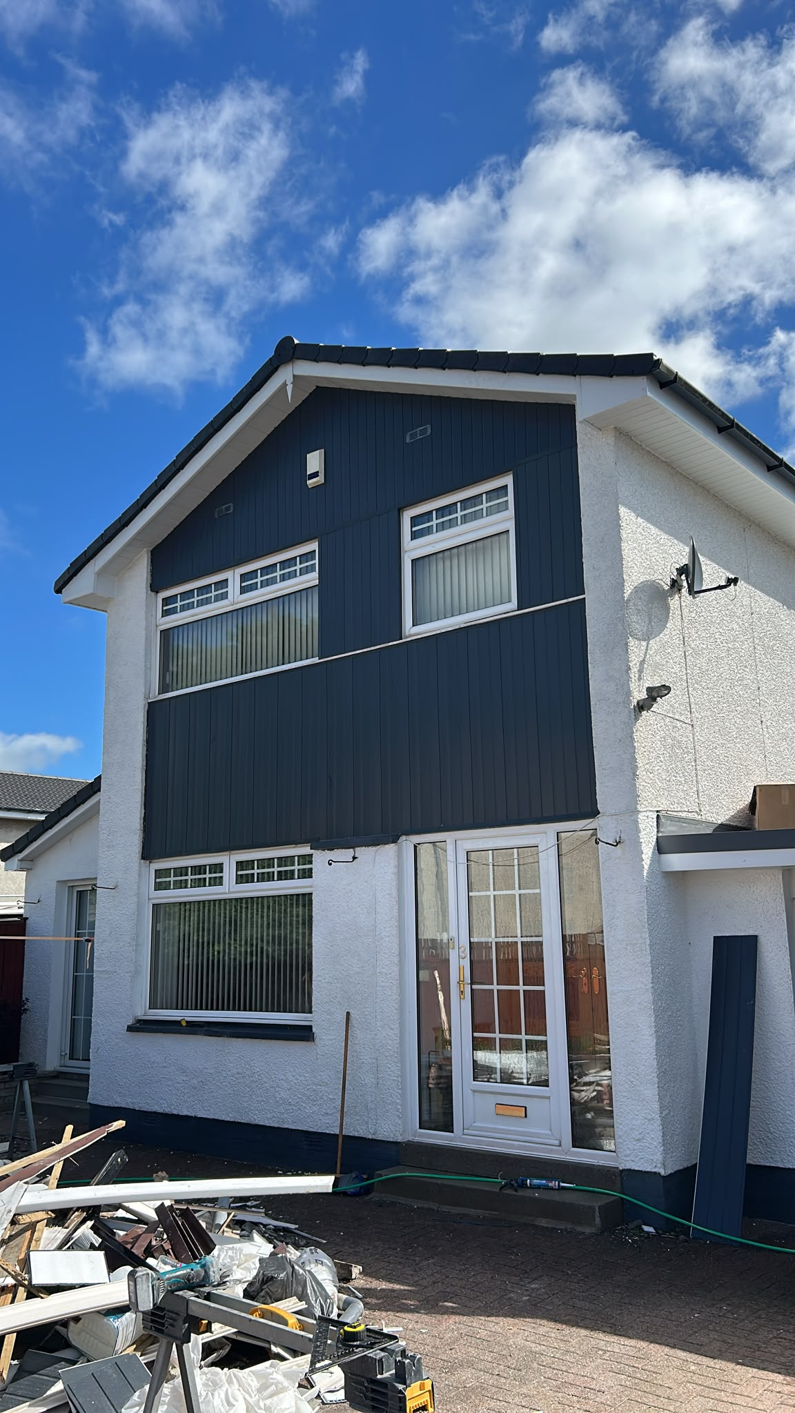 Roof edge with new fascia board and guttering fitted