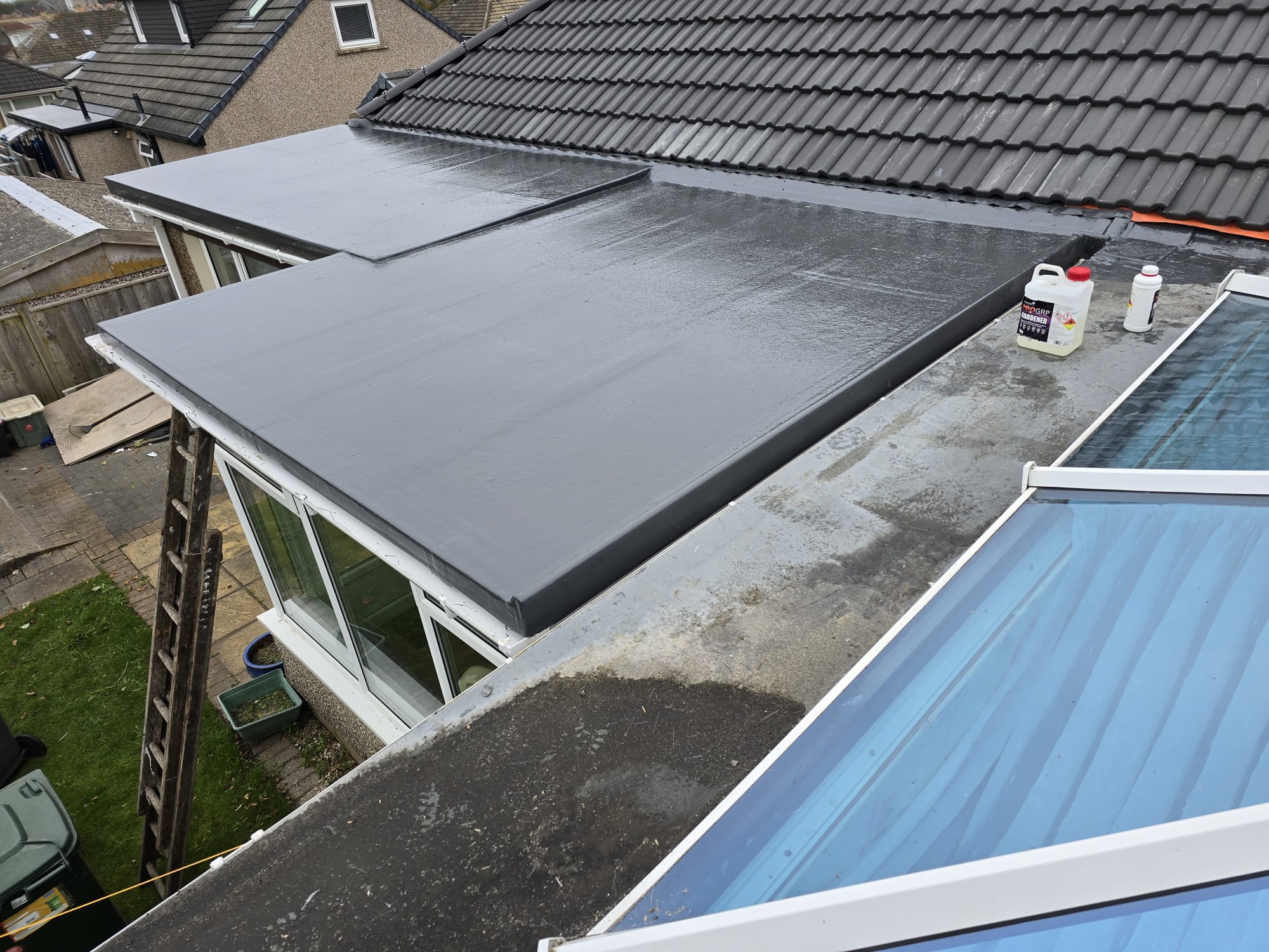 Flat roof section covered and sealed