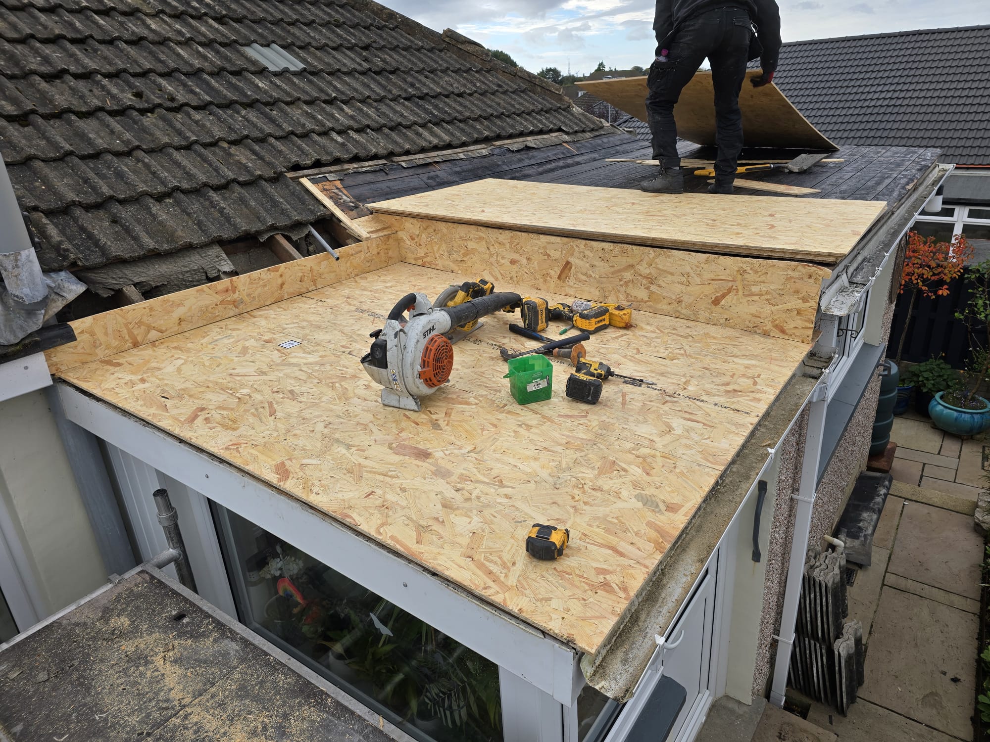 Front elevation of a house with a finished roof