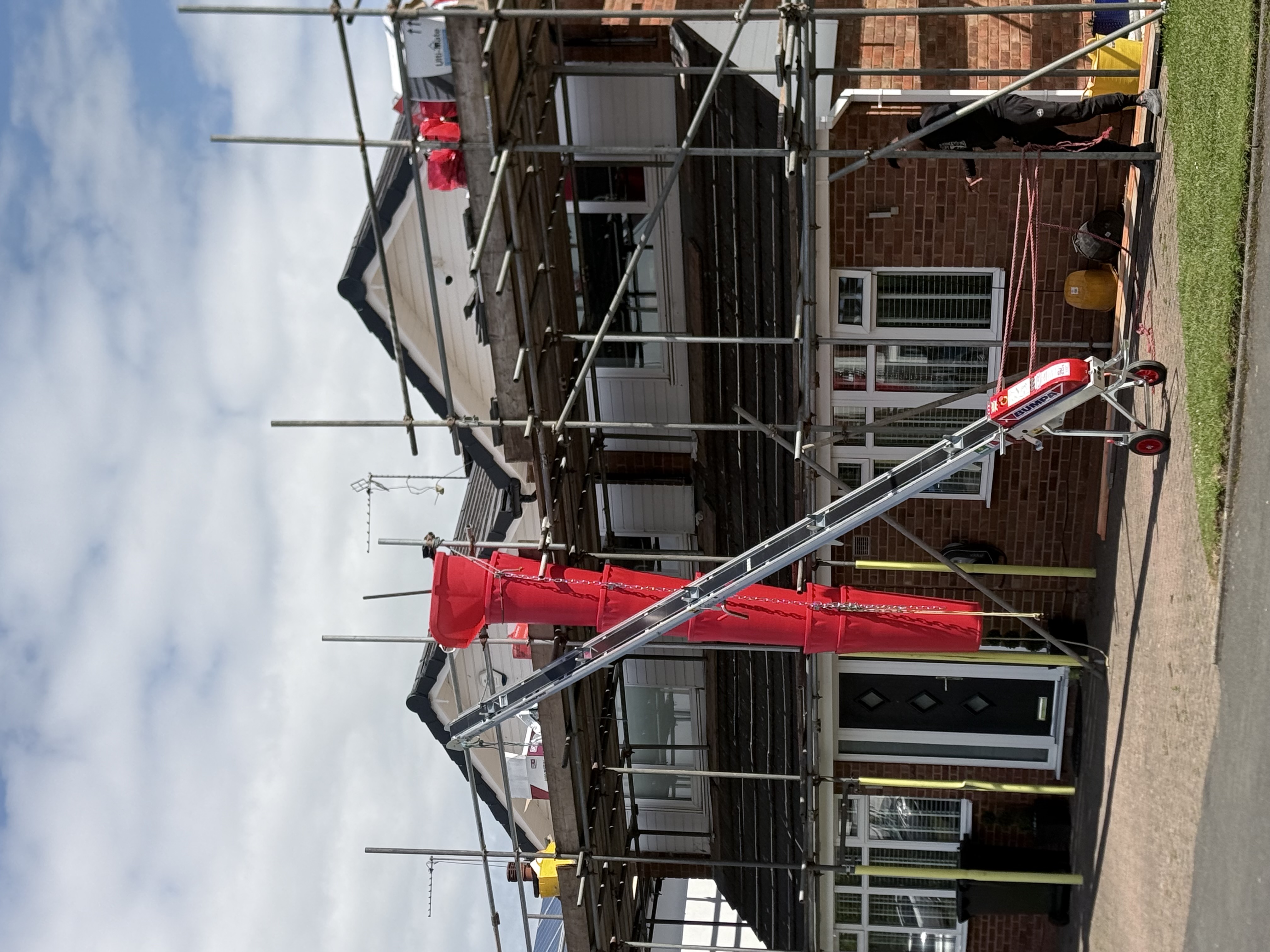 Roof mid-works with felt and battens fixed ready for slating
