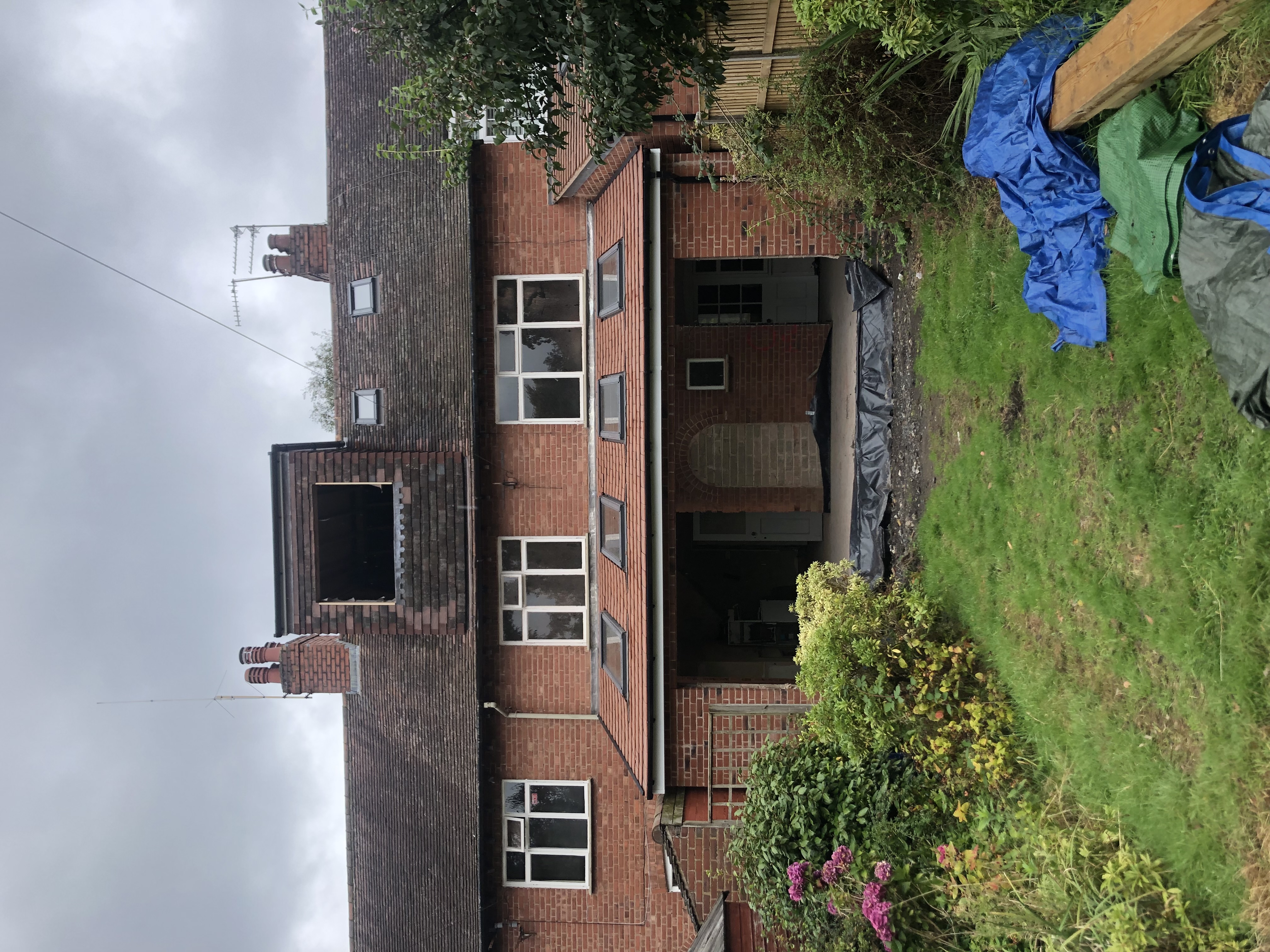 New roof covering with chimney re-leaded and repointed