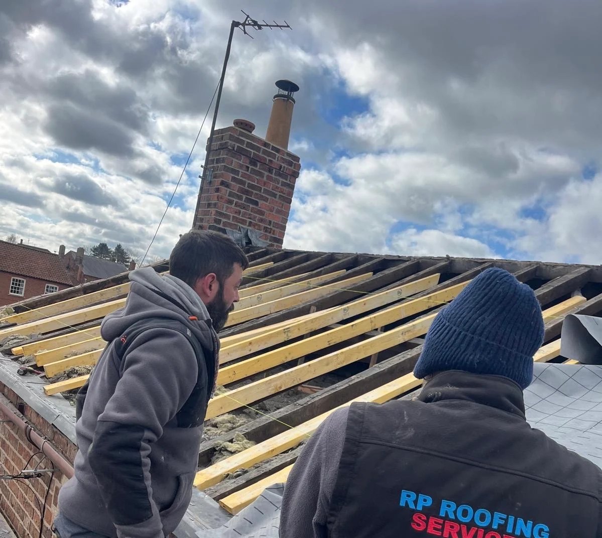 Sid of RP Roofing Services, on site in Stamford