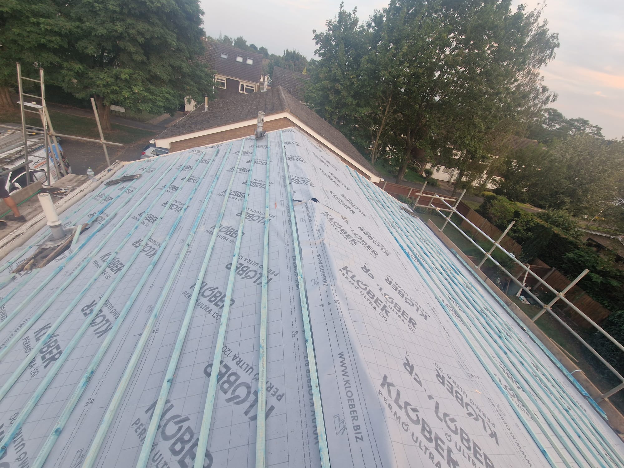 Roof membrane fitted across a pitched roof