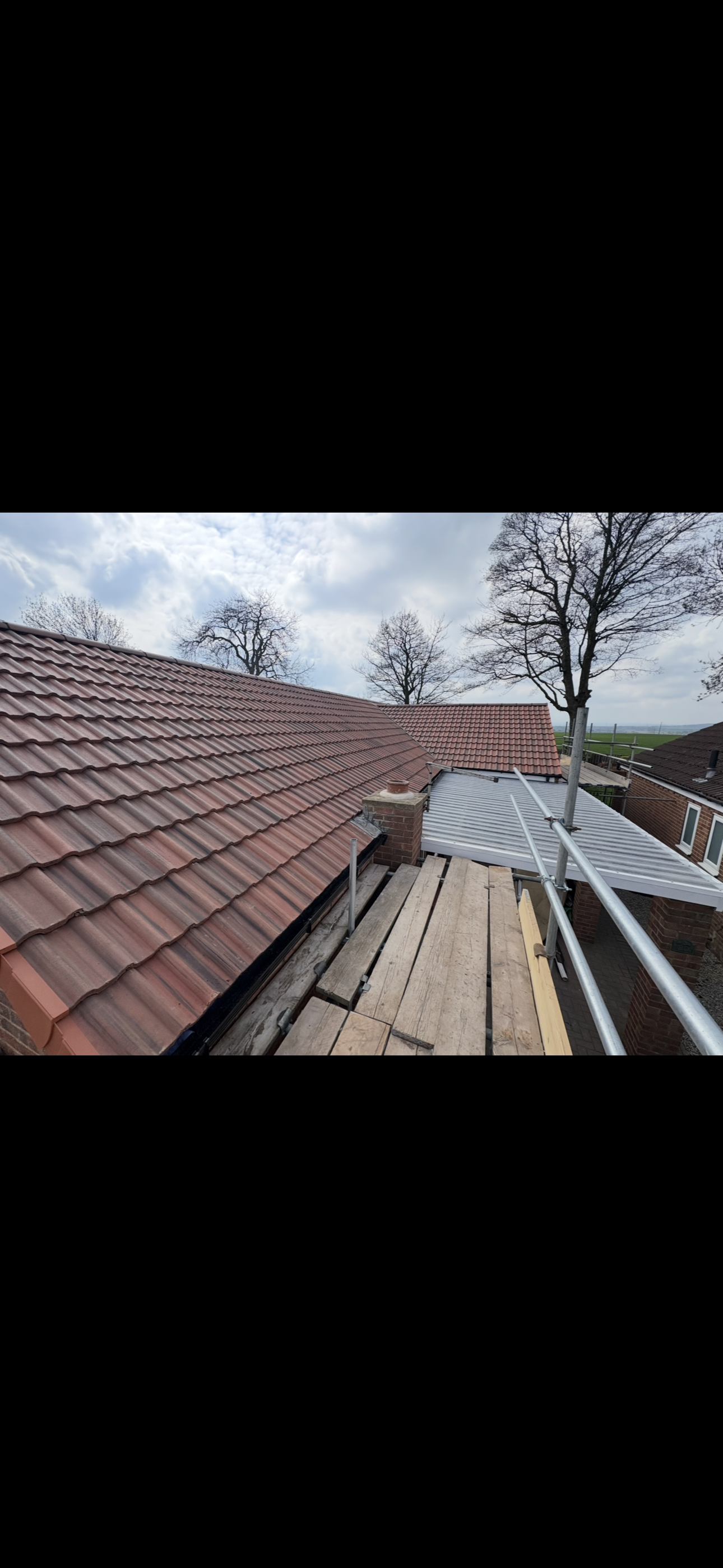 Finished roof slope with clean ridge line and tidy verge