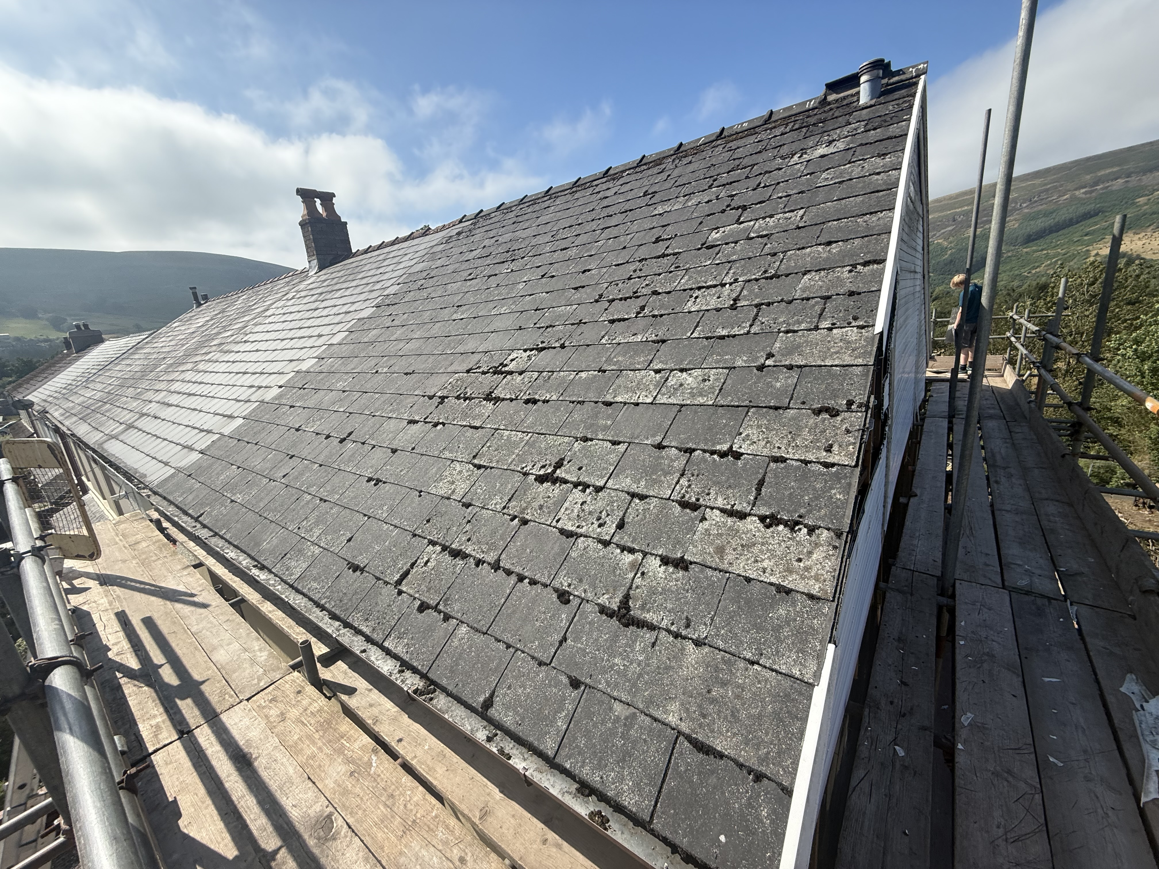 Section of roofing and guttering on a house in the Hereford area