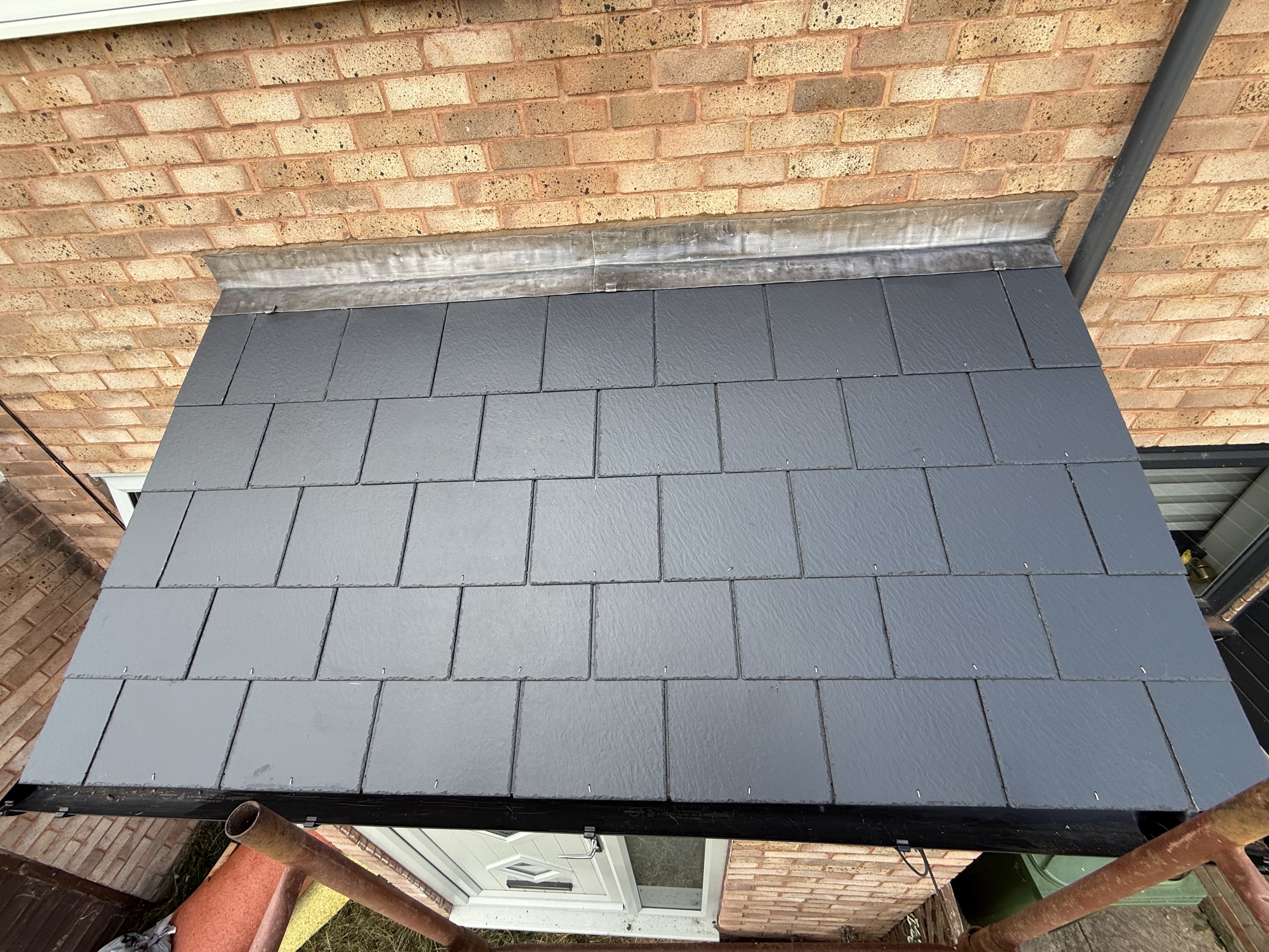 Completed roof on a home, photographed by the ASM & Sons team